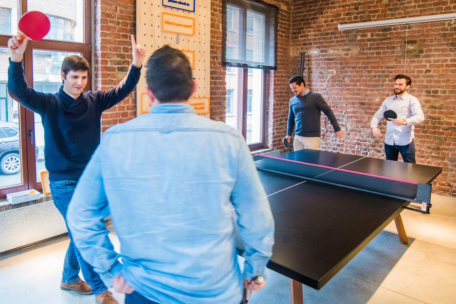 People playing table tennis